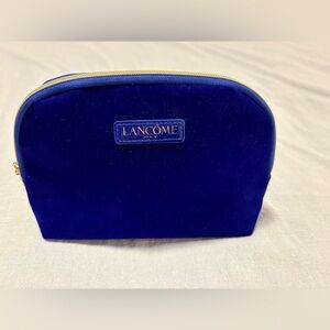 Free with purchase Lancôme Velvet Makeup Bag.